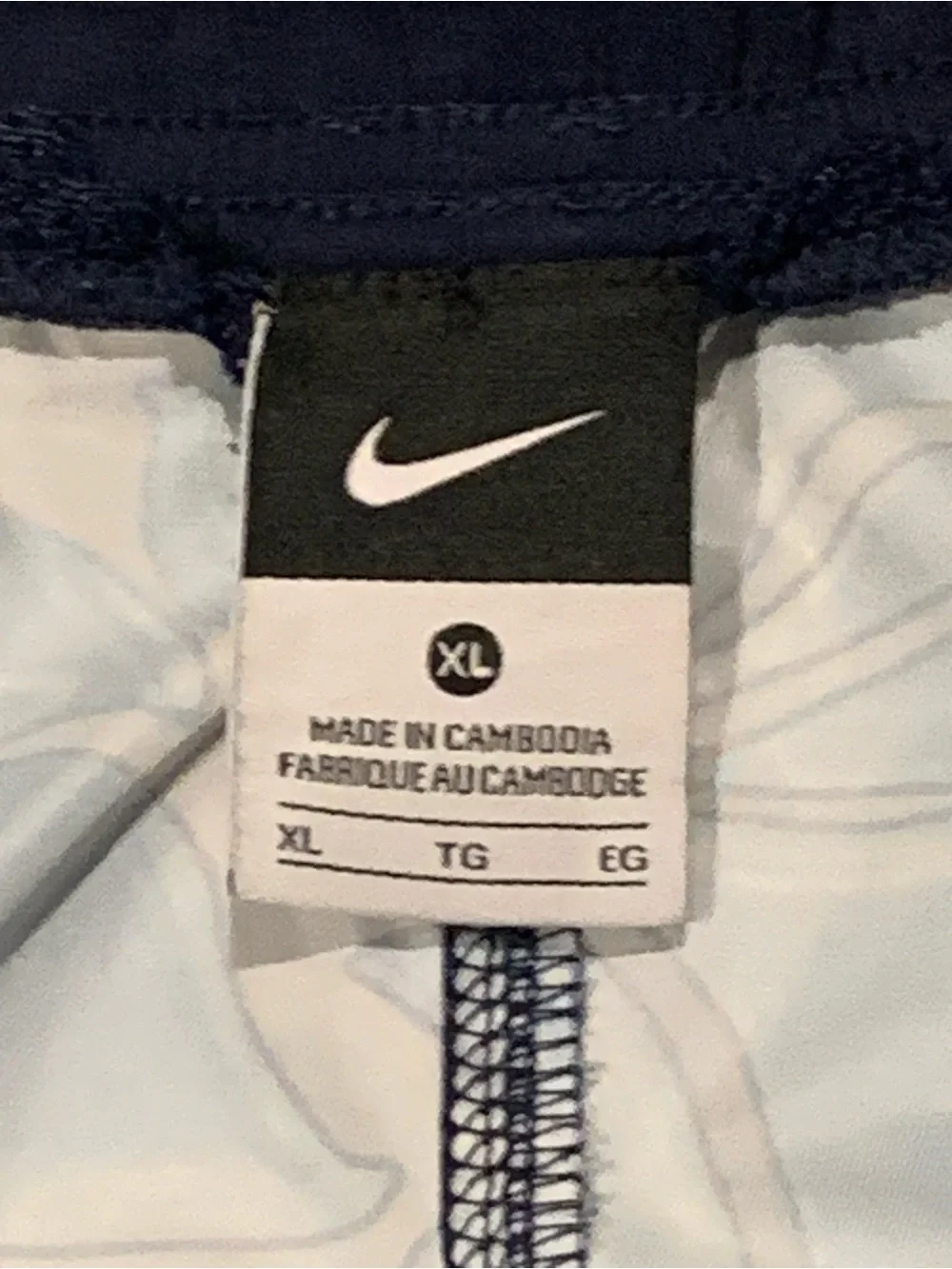 Nike Blue Floral Swim Trunks with Orange Swoosh